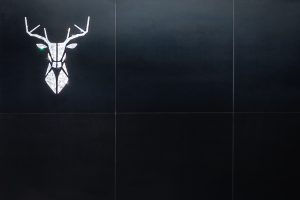 Leuchtendes Hirsch Logo