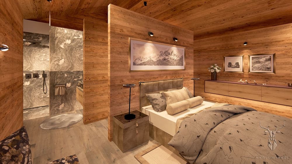 c35ebf0e-4bf1-40ec-965e-1ead50a343a6 Alpines Schlafzimmer mit En-suite Badezimmer Rauriser Naturstein
